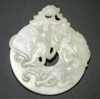 18th Century A pale celadon jade bi-disc